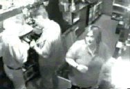 CCTV-footage-of-woman-in-small-shop-falling-down-open-trapdoor-animated-mono-1-ANON.gif