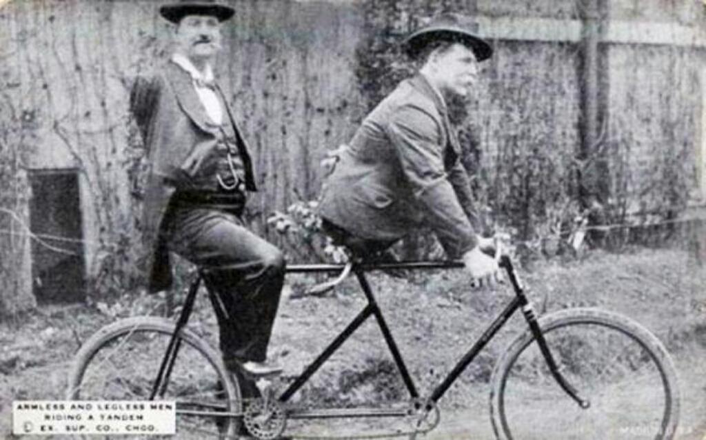 armless-and-legless-men-riding-tandem-1890s.jpg